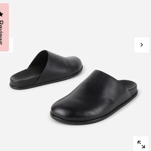 INTENTIONALLY BLANK Sleek Black Clogs